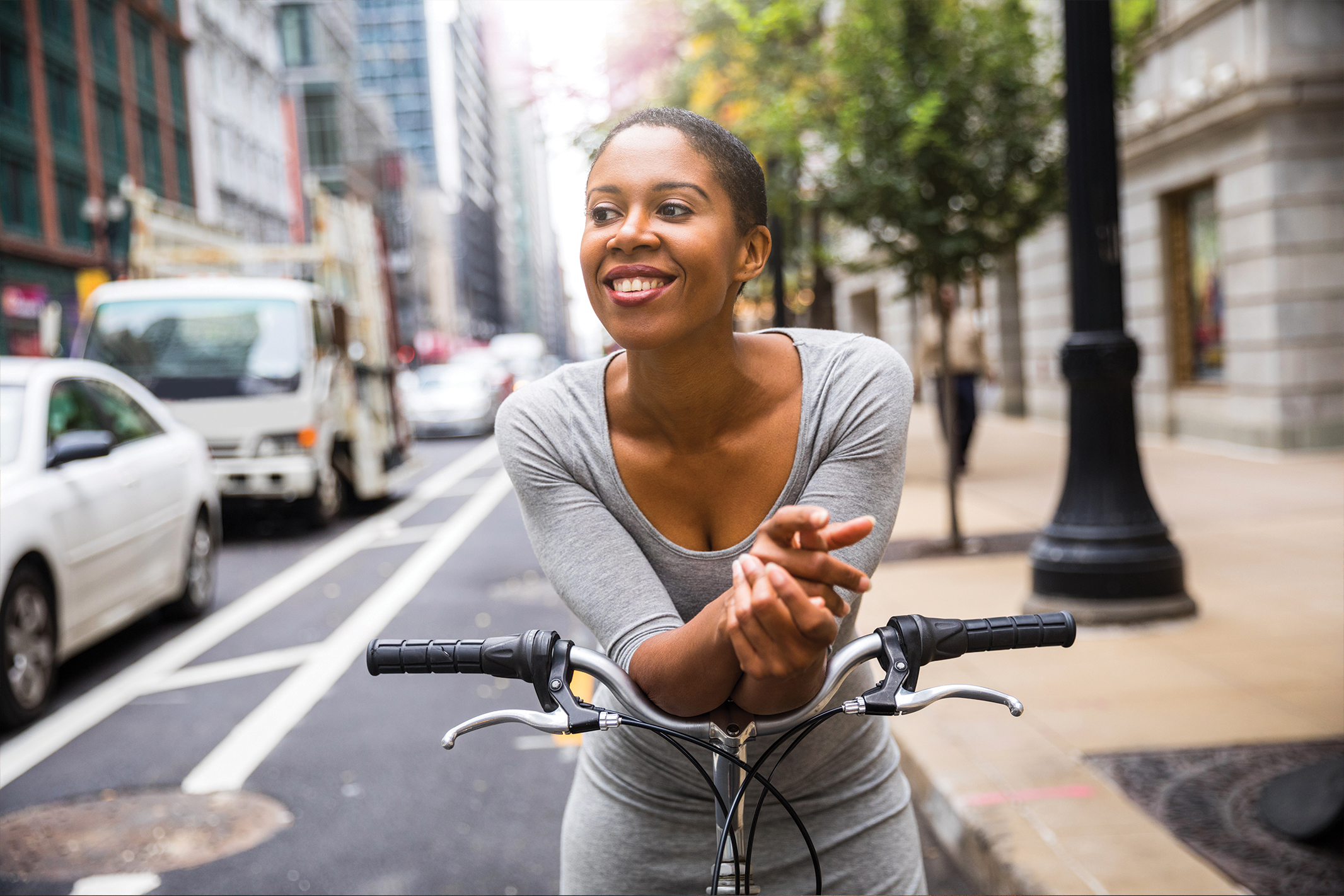 Woman smiling on bike